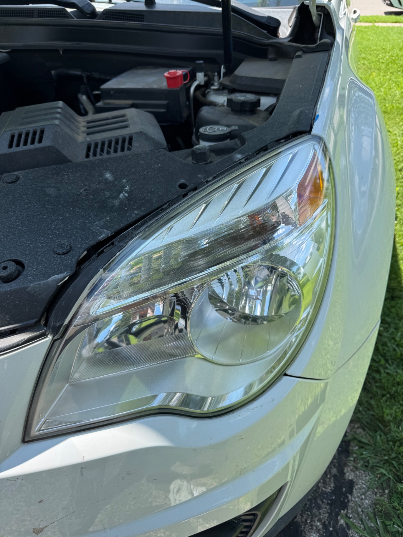 Restored Chevy Equinox driver headlight — crystal clear